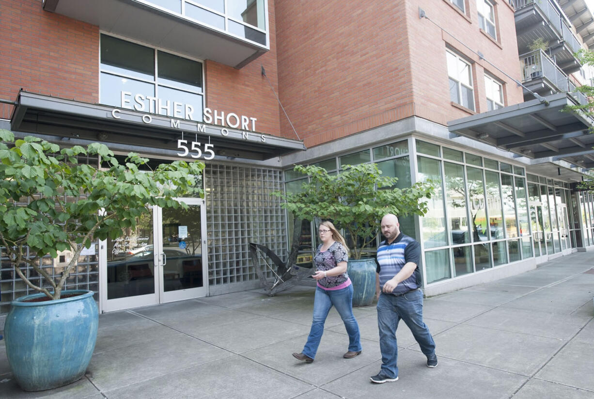 Large pots for trees at the entrance to the Esther Short Commons building were installed by Tom Tucker, owner of the retail space facing West Eighth Street. He also added lights to street trees to improve the retail block near Esther Short Park.