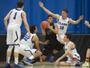 For the first time under coach Alex Kirk, the Clark College men's basketball team will be using more zone defense this season.