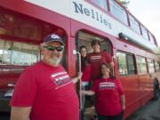 David Sale, left, and his daughter, Kayla; son, Joshua; and wife, Jeannette, restored a double-decker bus and transformed it into a food cart.