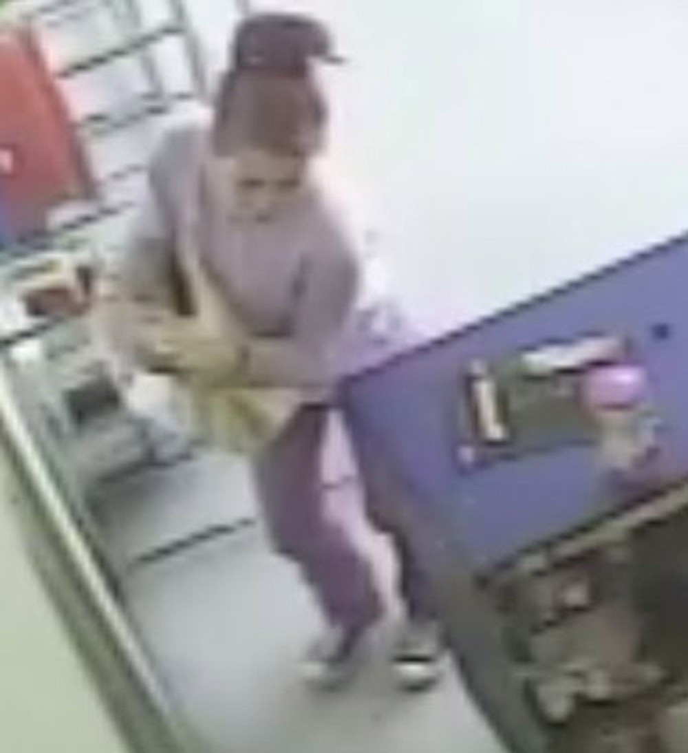 Photo courtesy of Vancouver Police Department
Police are looking to identify this female, who allegedly helped steal a purse from the Vancouver Tires &amp; Wheels Shop in Vancouver.