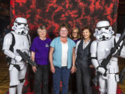 Fisher's Landing East: Ellen Schroder, from left, Jan Berg, Sandi Long, Diane Stevens with Stormtroopers at a fundraiser for Furry Friends on May 16.