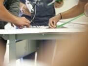 Zachary Kaufman/The Columbian
Students build radio-controlled gliders as part of a new aviation technology program at the Clark County Skills Center on Tuesday.