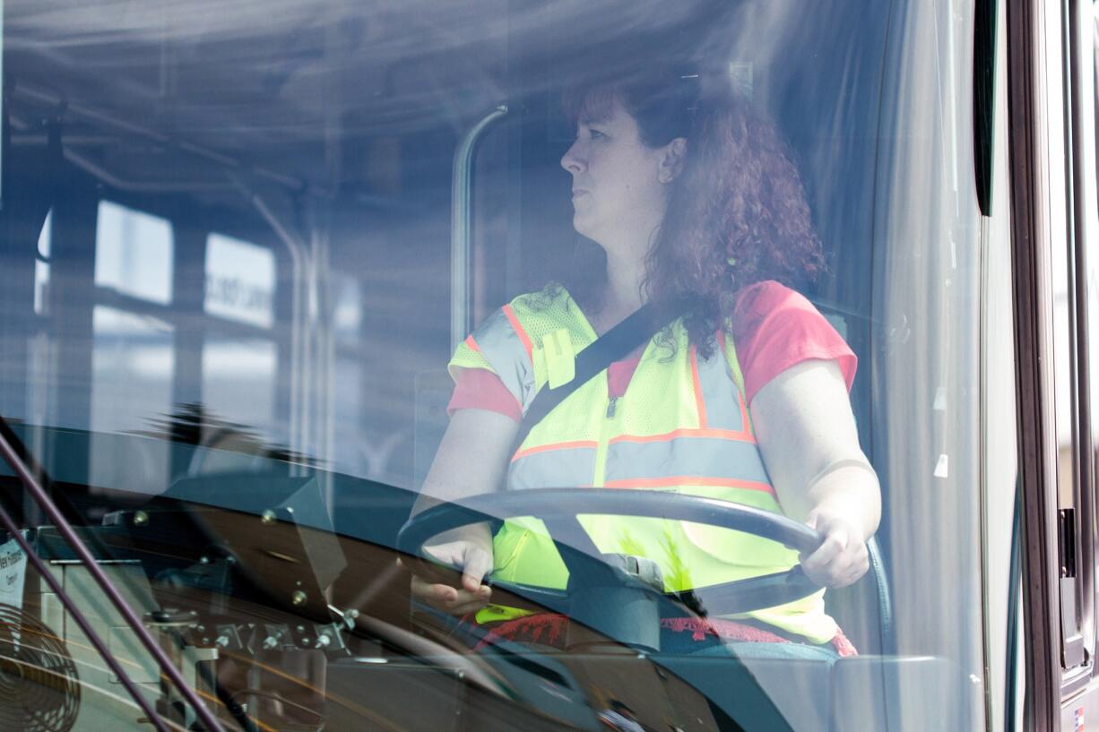 Bus Driver Mary Sanders positions herself for the left-hand reverse section of the obstacle course Sunday at the 2015 C-Tran Roadeo in Vancouver.