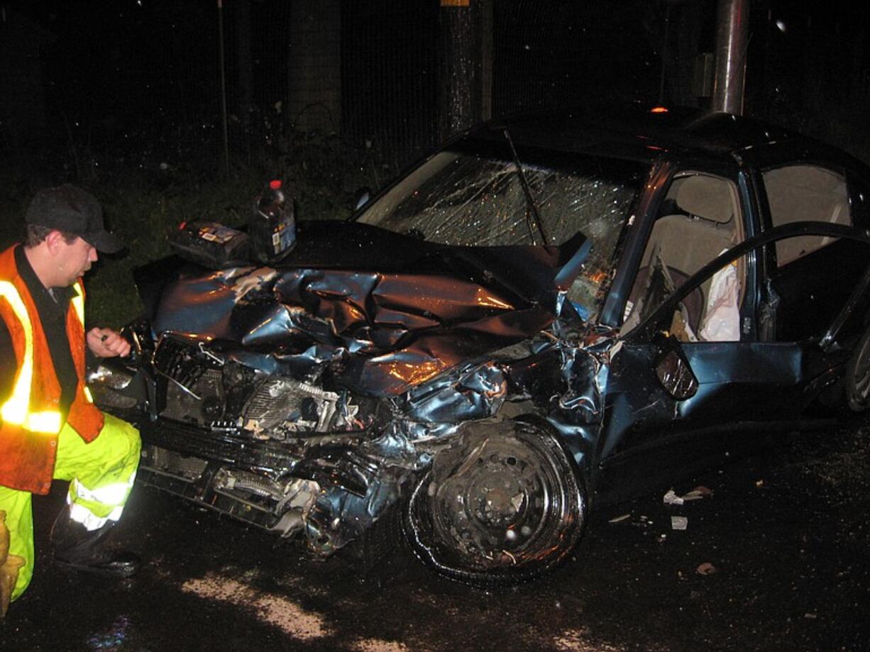 A woman was hurt in this two-vehicle collision about 8:40 p.m.