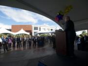 Clark College President Bob Knight reveals the amount of money raised during a five-year fundraiser in a ceremony Tuesday at the college.