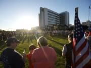 Supporters of wounded Vancouver police Officer Dustin Goudschaal gather Tuesday evening for a vigil in his honor at PeaceHealth Southwest Medical Center in Vancouver.