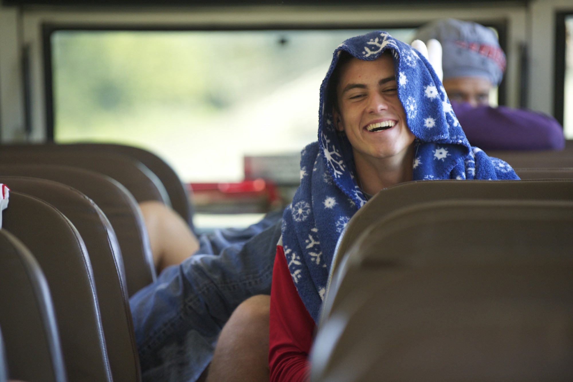 Quarterback Reilly Hennessey and the Camas team make the long bus ride north to play Auburn Mountainview, September 19, 2013. Camas beats Auburn Mountainview 69-24.