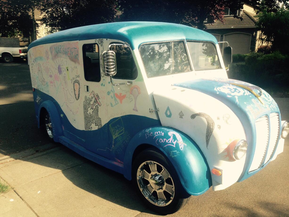 Author Rafael Gruszecki turned a 1952 Divco milk truck into a rolling chalkboard as part of his book campaign for &quot;Mark From Earth.&quot;