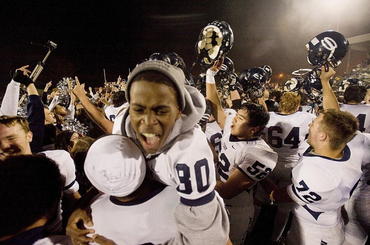 The Skyview football team celebrates after beating Union at McKenzie Stadium, Friday, October 29, 2010.