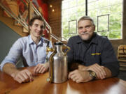 Photos by Steven Lane/The Columbian
Founders Shawn Huff, left, and Chris Maier have launched GrowlerWerks, which has developed a custom beer growler called uKeg to keep beer fresh and cold. Maier, a Camas resident, is the company's CEO.