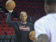 Portland Trail Blazers assistant coach Dale Osbourne warms up with players before a game at the Moda Center in Portland Wednesday January 14