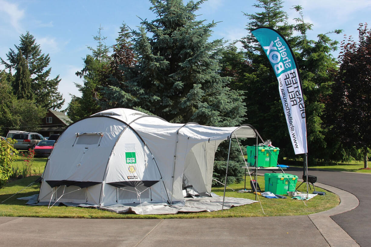 Set up on this Ridgefield lawn is everything that comes out of a typical shelterbox -- which is everything a family needs to survive after a disaster, according to John Cordell.