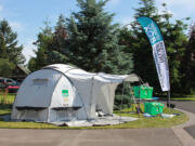 Set up on this Ridgefield lawn is everything that comes out of a typical shelterbox -- which is everything a family needs to survive after a disaster, according to John Cordell.