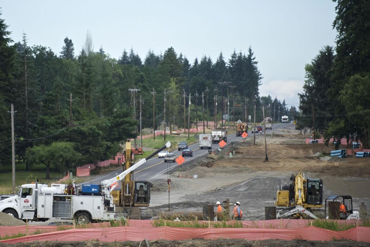 Crews are tackling a variety of jobs as the Washington State Department of Transportation prepares to widen state Highway 502 between Interstate 5 and Battle Ground.