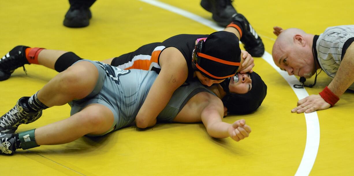 Yaneli Martinez of Washougal High pins Isabelle Morales of Union in the 105 final at the Boys and Girls finals of the Clark County wrestling championships in Vancouver, WA., Saturday., Jan.