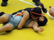 Yaneli Martinez of Washougal High pins Isabelle Morales of Union in the 105 final at the Boys and Girls finals of the Clark County wrestling championships in Vancouver, WA., Saturday., Jan.