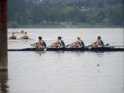 Crews teams row in races Friday on Vancouver Lake as part of the Pacific Northwest championships.