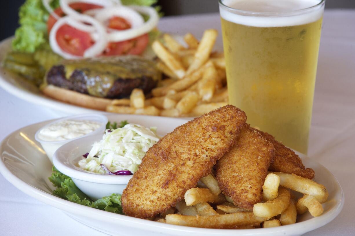 The menu at Sportsman's Restaurant and Lounge in Ridgefield offers wild-caught Alaskan cod and chips and the Main Street Cheddar Burger with Tillamook sharp cheddar, made with certified Angus beef.