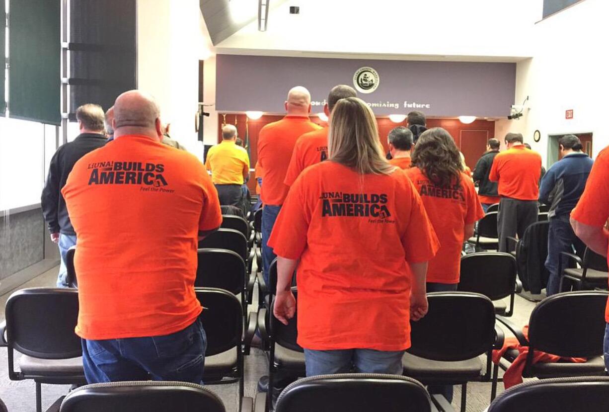 Kaitlin Gillespie/The Columbian
Organized labor supporters, wearing orange shirts, appeared at a Clark County council meeting Tuesday. They came to object to resolutions that would establish a right-to-work rule and public labor negotiations.