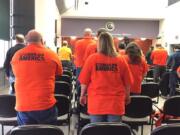 Kaitlin Gillespie/The Columbian
Organized labor supporters, wearing orange shirts, appeared at a Clark County council meeting Tuesday. They came to object to resolutions that would establish a right-to-work rule and public labor negotiations.