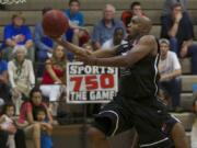 Vancouver Volcanoes guard Andre Murray shoots against the Portland Chinooks.