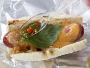 A Thai Curry Dog with penang curry, Thai basil and a homemade chili sauce is served Feb. 10 at The Nomad food cart in Vancouver.