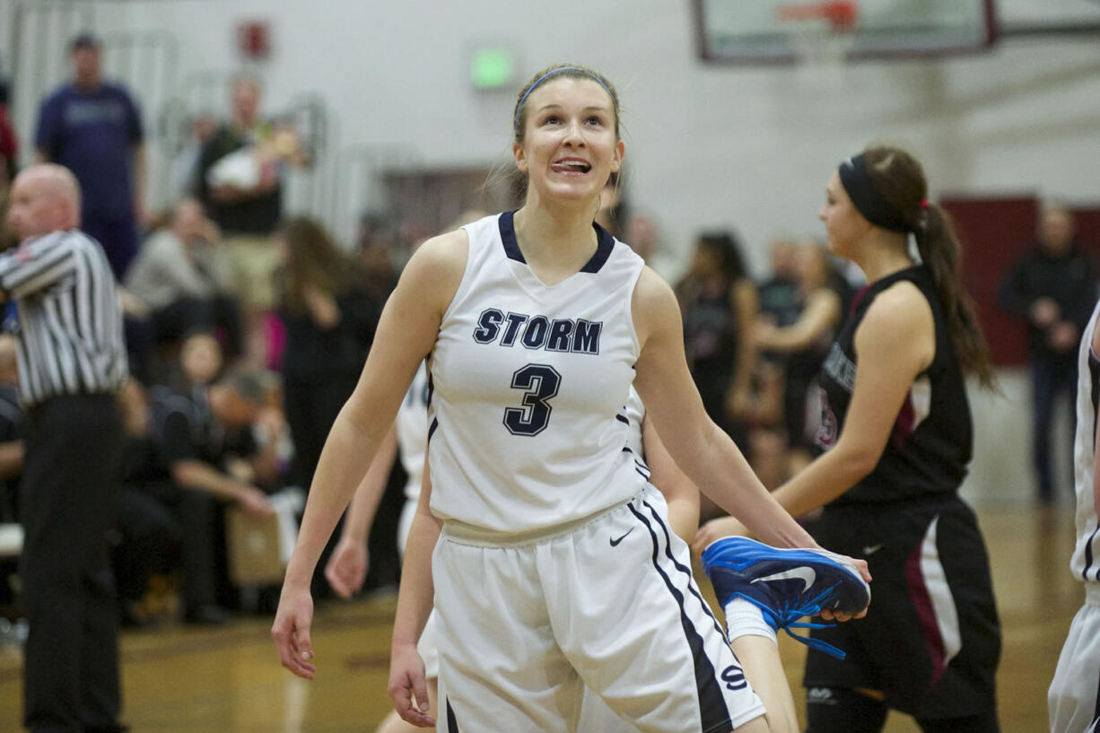 Skyview's Riley Friauf prepares to shoot the game winning free throw as Skyview beats Kentlake 54-53 at the Hardwood Classic Regional Round, Saturday, February 28, 2015.