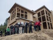 Visitors mark the ground-breaking Thursday for the Deerhaven subdivision of luxury homes in the north shore area of Lacamas Lake in Camas, where development is beginning after a major annexation by the city and years of planning.