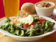 Spinach salad and beer cheese soup are amon the menu options at Amnesia Brewing in Washougal.