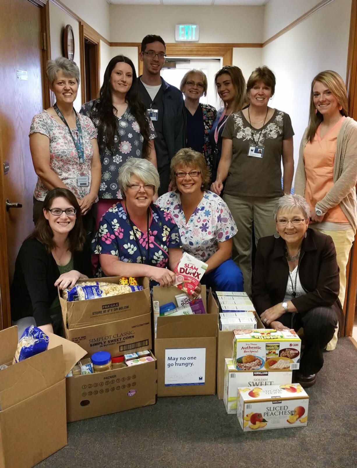 Central Vancouver: Legacy Health employees with some of the more than 40,000 pounds of food they collected for 11 local food banks.