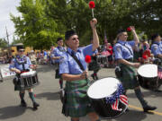 Bagpipe bands are Scottish, but on July 4, also all-American.