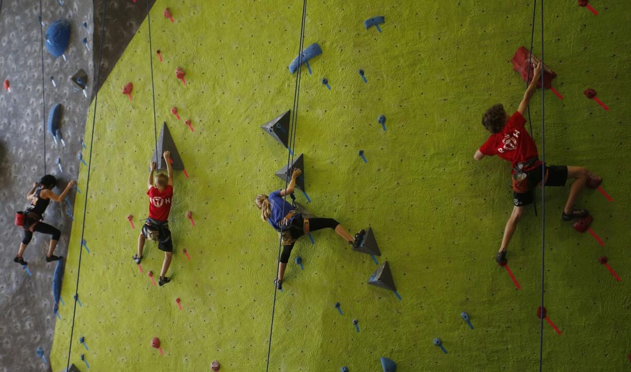 Climbers compete in a regional competition hosted by Source Climbing Center in Vancouver on Saturday.