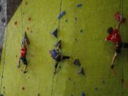 Climbers compete in a regional competition hosted by Source Climbing Center in Vancouver on Saturday.