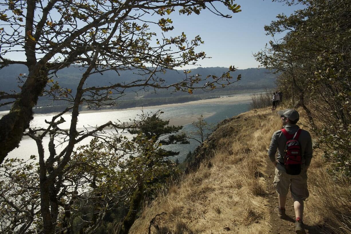 Hikers walk the Cape Horn Trail in the Columbia River Gorge, Sunday, October 7, 2012.