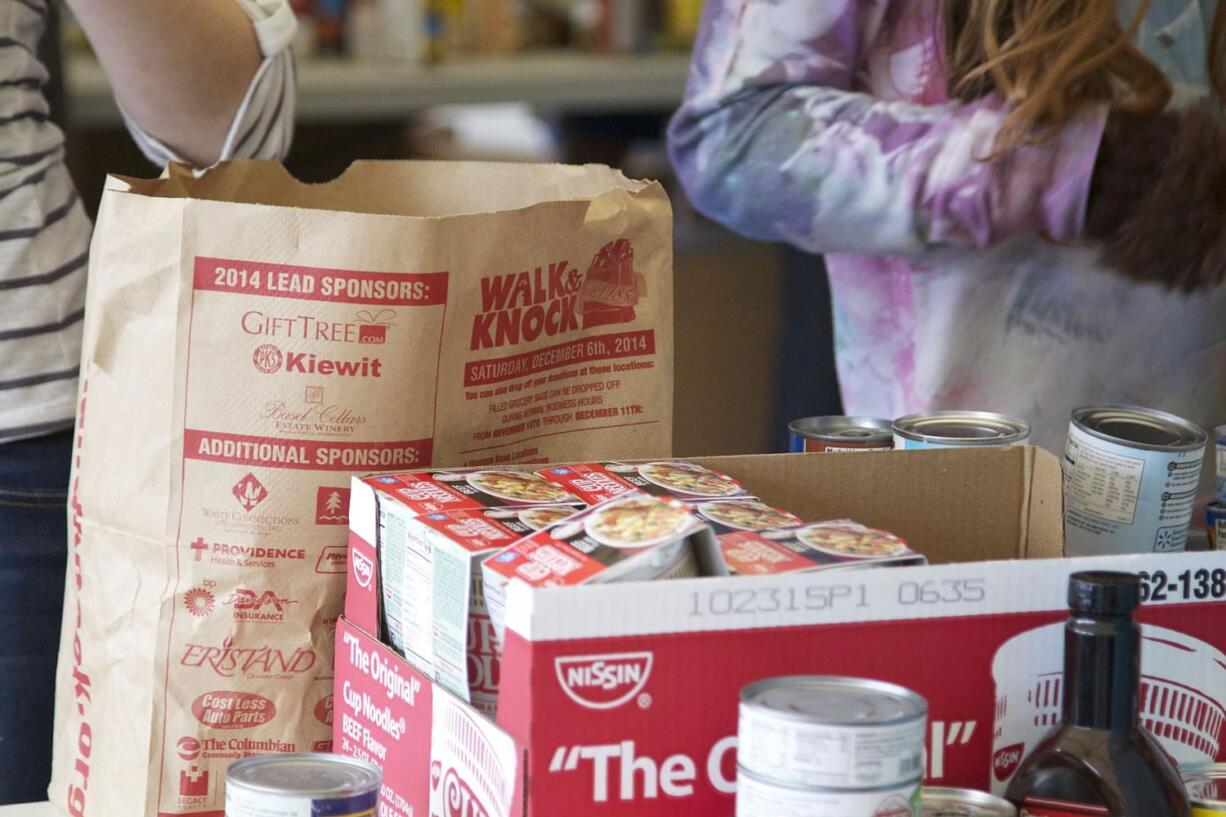 Volunteers fanned out across Clark County on Saturday to collect donations for the annual Walk & Knock in Vancouver.