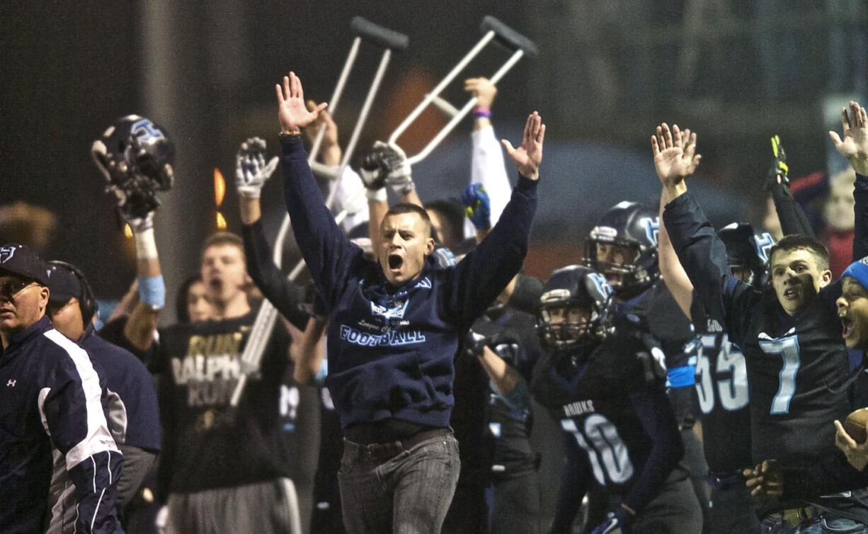 Hockinson's sideline reacts after Quentin Boedenhamer's 23-yard field goal with less than two minutes remaining gave the Hawks a 24-21 lead over Black Hills that stood as the final.