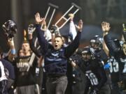 Hockinson's sideline reacts after Quentin Boedenhamer's 23-yard field goal with less than two minutes remaining gave the Hawks a 24-21 lead over Black Hills that stood as the final.