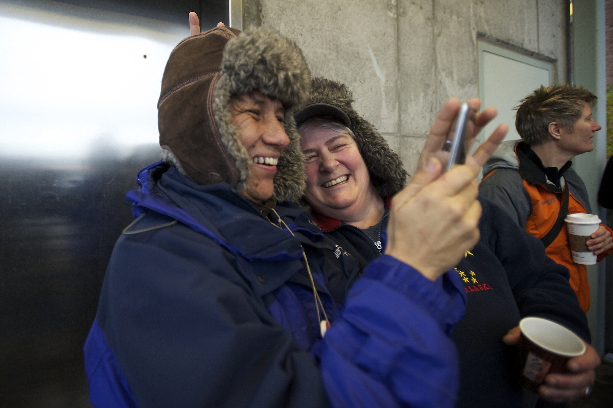 Shawn Sanders and her partner, Jocelyn Guzman, stand with other same-sex couples Dec.