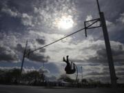 Boy's pole vault at the Tiger Invitational track and field meet at Battle Ground high school.(Steve Dipaola for the Columbian)