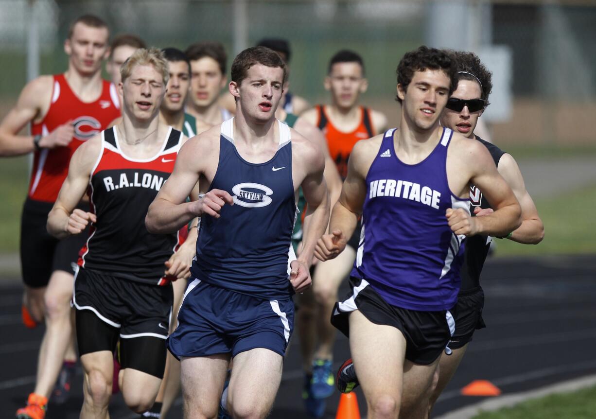 Runners compete in the boys 800 meters at the Tiger Invitational in Battle Ground.