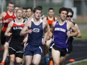 Runners compete in the boys 800 meters at the Tiger Invitational in Battle Ground.