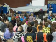 Students from Orchards Elementary School learn about sharks during a presentation Tuesday by the Oregon Coast Aquarium in Vancouver.