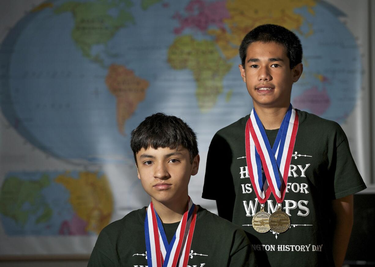 Pleasant Valley Middle School students Jethro Abatayo, right, and Logan Gibert, both 14, finished first in their division at National History Day with their documentary, &quot;Vietnam War Prisoners of War: Taking Responsibility When Deprived of All Rights.&quot; The students interviewed Vietnam War POWs and spent about 600 hours producing a documentary. Their history teacher is Irene Soohoo.