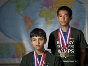 Pleasant Valley Middle School students Jethro Abatayo, right, and Logan Gibert, both 14, finished first in their division at National History Day with their documentary, &quot;Vietnam War Prisoners of War: Taking Responsibility When Deprived of All Rights.&quot; The students interviewed Vietnam War POWs and spent about 600 hours producing a documentary. Their history teacher is Irene Soohoo.