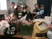 Orchards: Frontier Middle School students stand with donations they helped gather for the Share House during the first Orio Palmer Share House Donation Drive, named after the New York City Fire Department Battalion Chief who died in the 9/11 terrorist attack.