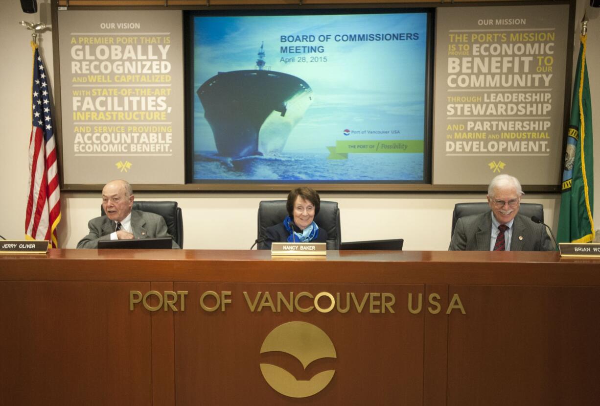 Port commissioners Jerry Oliver, from left,  Nancy Baker, and Brian Wolfe at a meeting at the the Port of Vancouver in April.