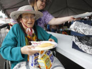 84 year old Dorris Cotten of Vancouver was at the front of the line for pancakes on first day of Clark County fair.