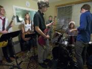 Here's an Opus Music School Jam Band of a few years back, working hard in the studio.