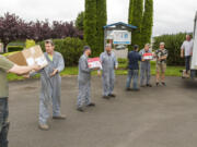 Woodland: Employees from Lined Valve Company load up 20 boxes of food, clothing and personal items they donated to the Woodland Action Center to celebrate the company's 20th anniversary.