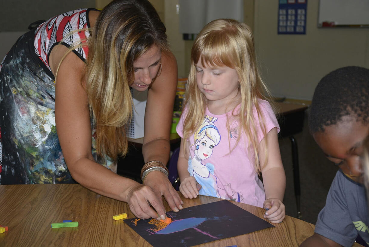 Washougal: Local artist Elida Field, left, taught students like Chevy Gilderhus that there are no mistakes in art during a three-day course this summer.